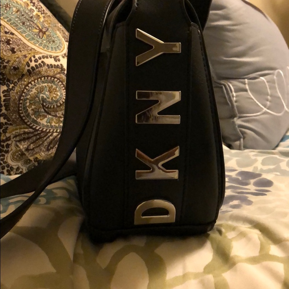 DKNYblack satchel bag.Includes unopened dustbag.
